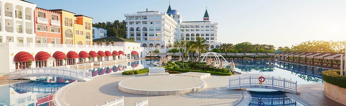 swimming pool and beach of luxury hotel and outdoor pools and a spa. amara dolce vita luxury hotel. resort. tekirova kemer. turkey.